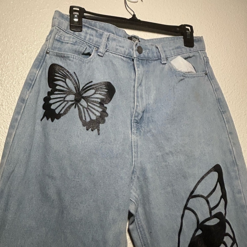 Black and Blue Straight Leg Jeans with Artistic Flair
